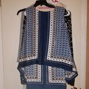 Fun2fun sleeveless top with peek-a-boo back detail